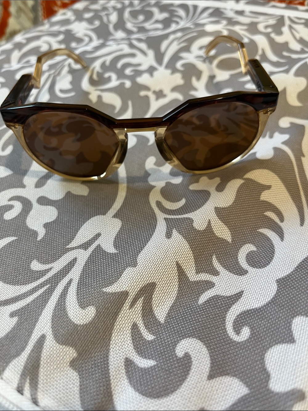 Oakleys - Women's Brown Round Sunglasses - Translucent Brown Frame